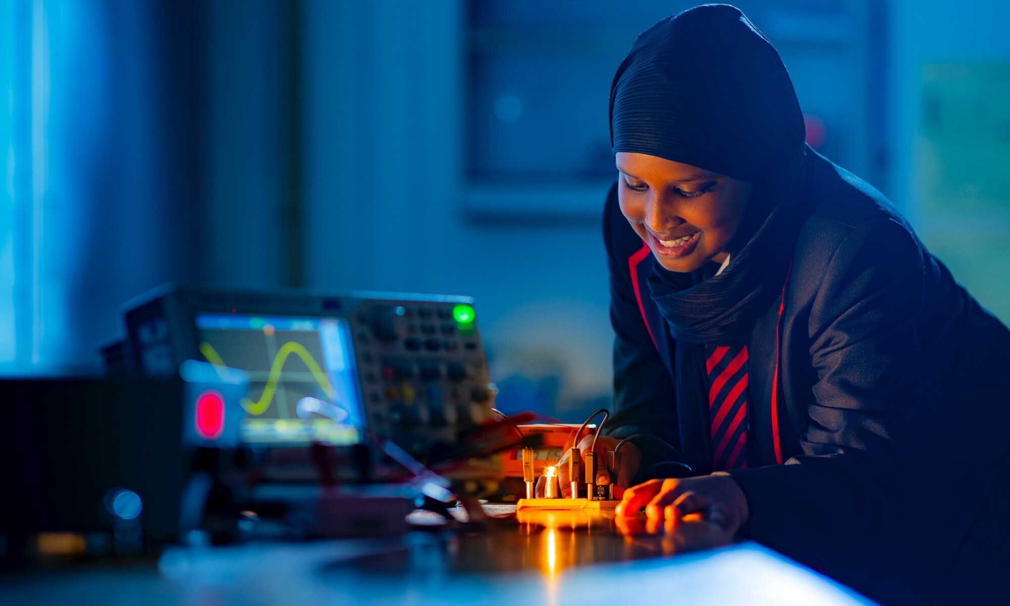 George Green's Student Working on Electronics